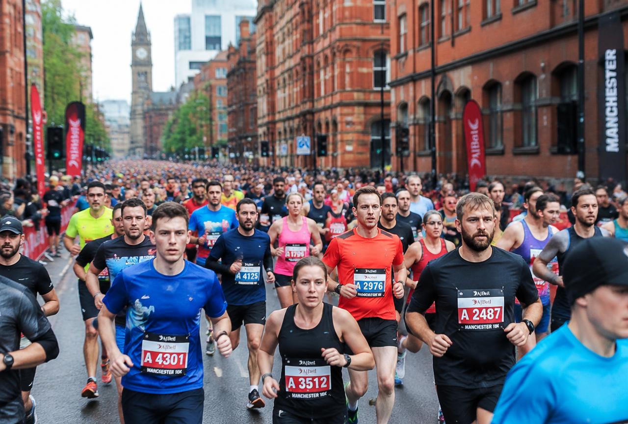Road running atmosphere in Manchester, England, representing Manchester 10K